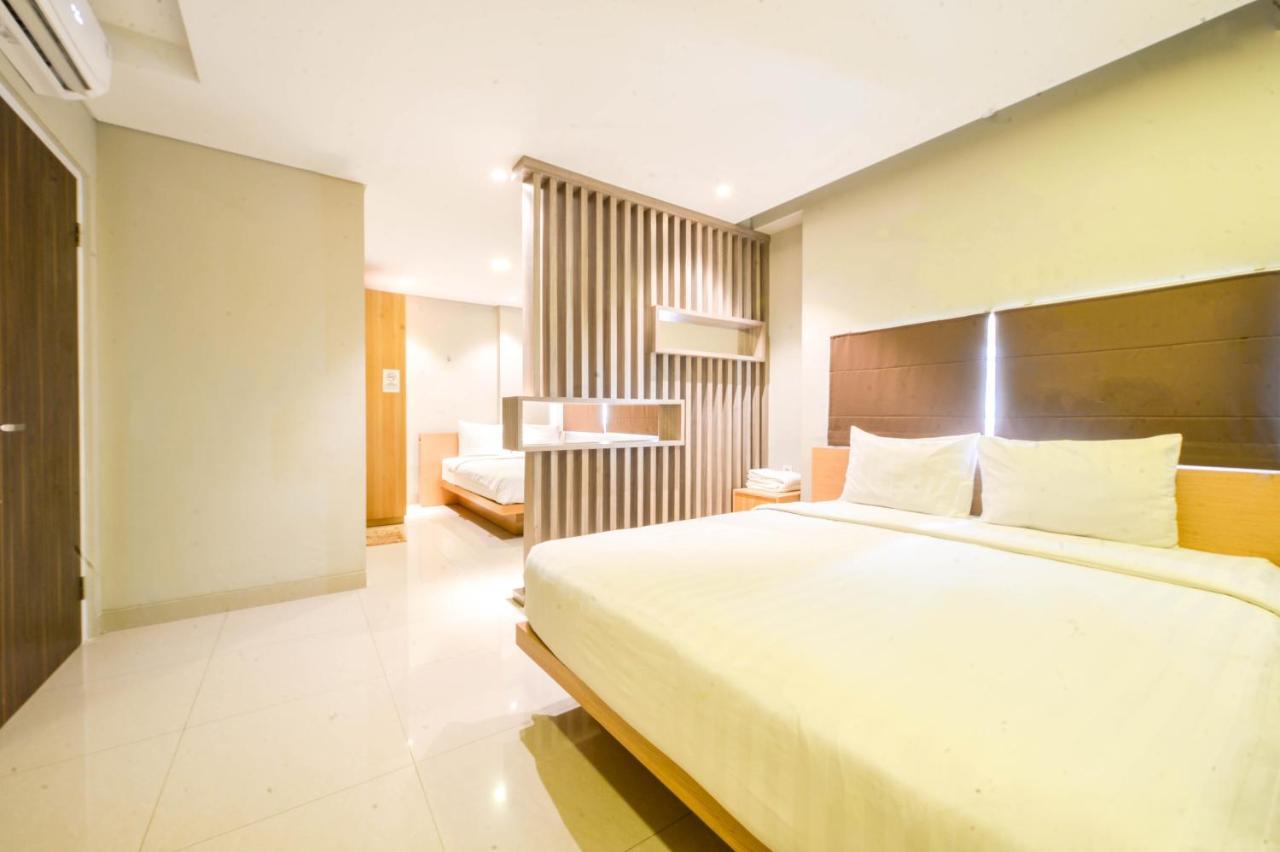 Kamar Eksekutif Queen dengan 2 Tempat Tidur Queen